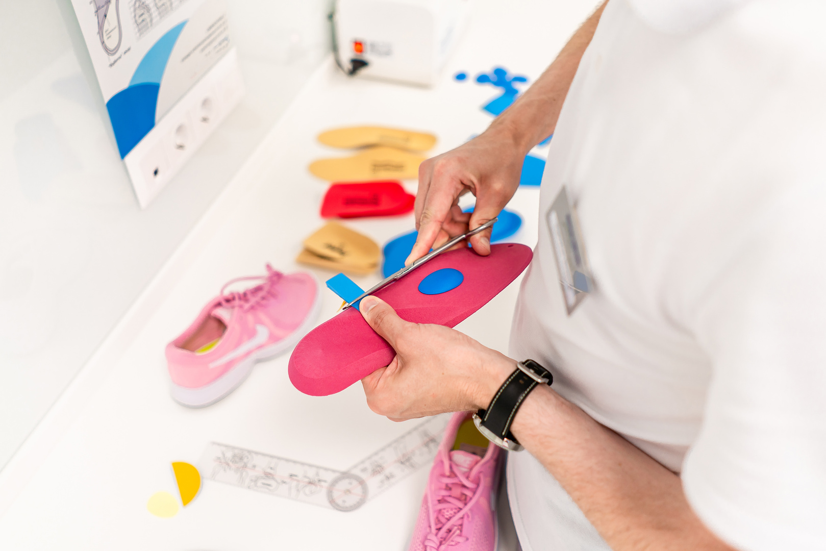 Orthopedic Insoles. Fitting Orthotic Insoles. Flatfoot Treatment. Podiatry Clinic.